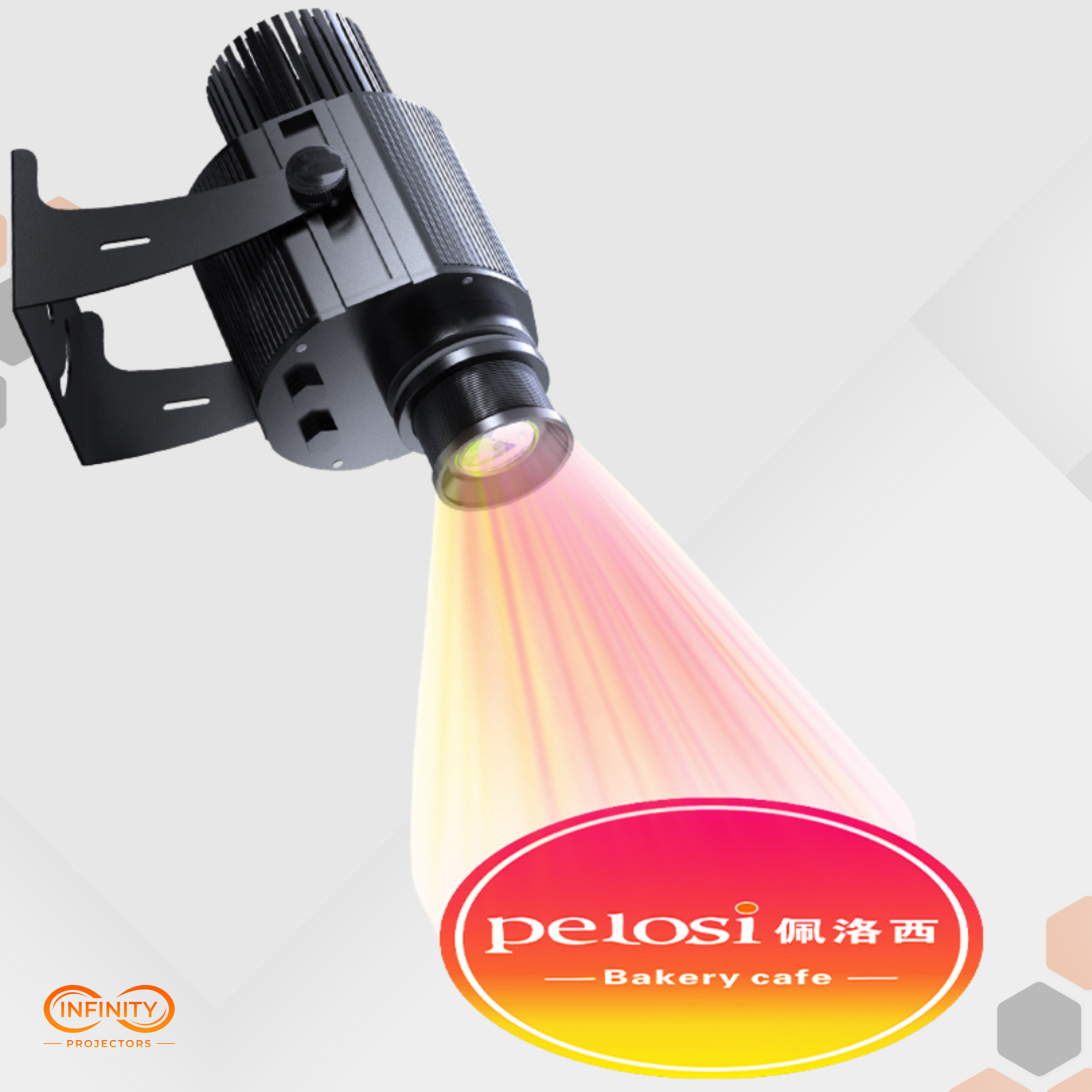 Wall-mounted color gobo projector beaming a round bakery cafe logo in red and yellow light