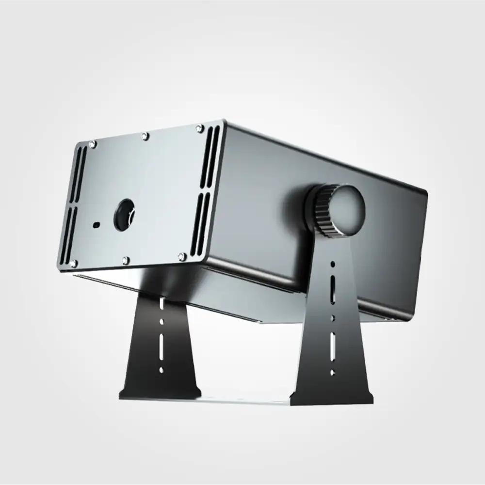 Outdoor video projector in black metal housing, rear angle showing lens knob and adjustable mounting brackets