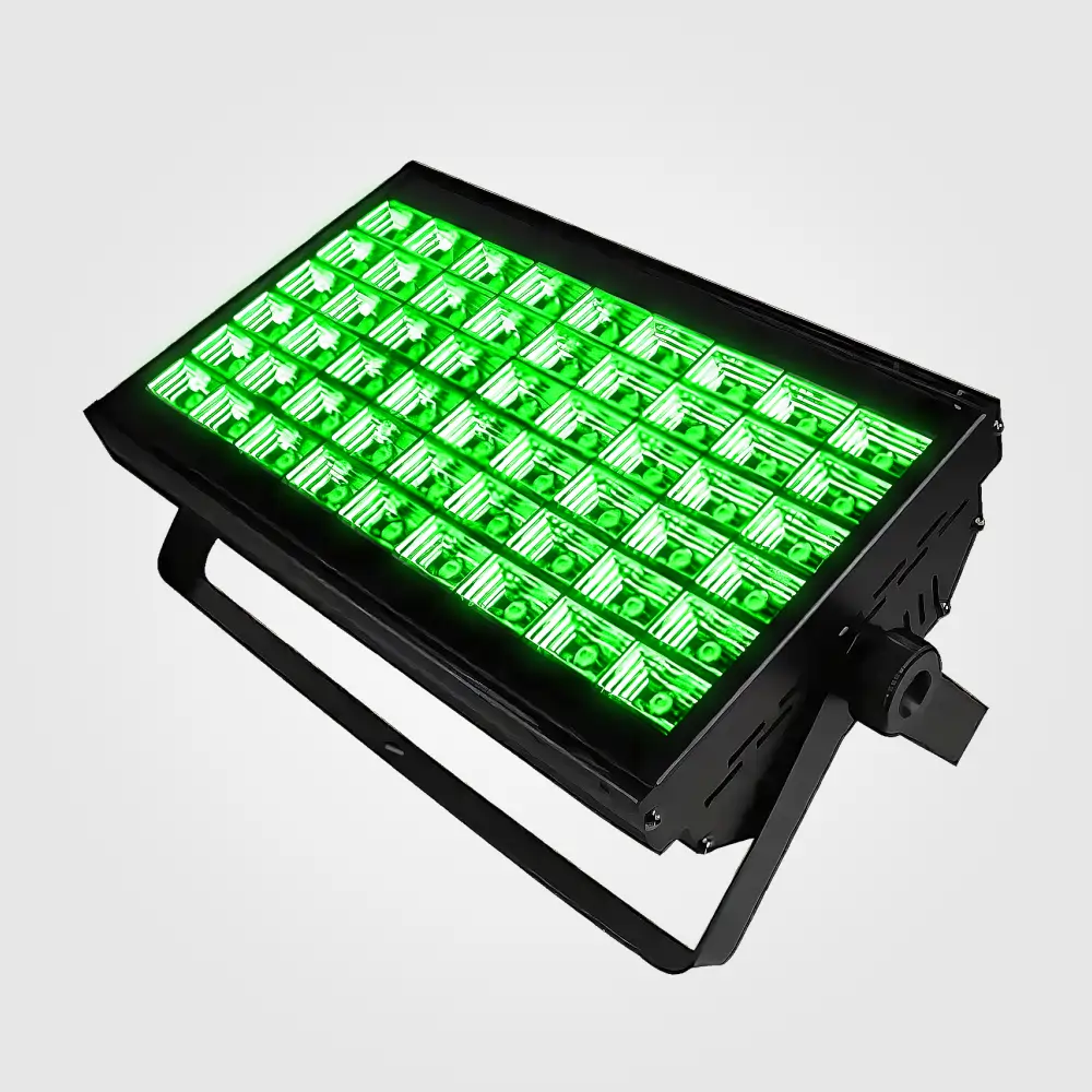Top-angled view of the 54x3W LED wash panel glowing green, showing its yoke bracket and rear knob