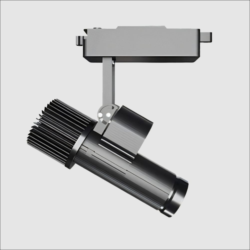 Track mounted gobo projector with silver track adapter and black finned aluminum lens barrel