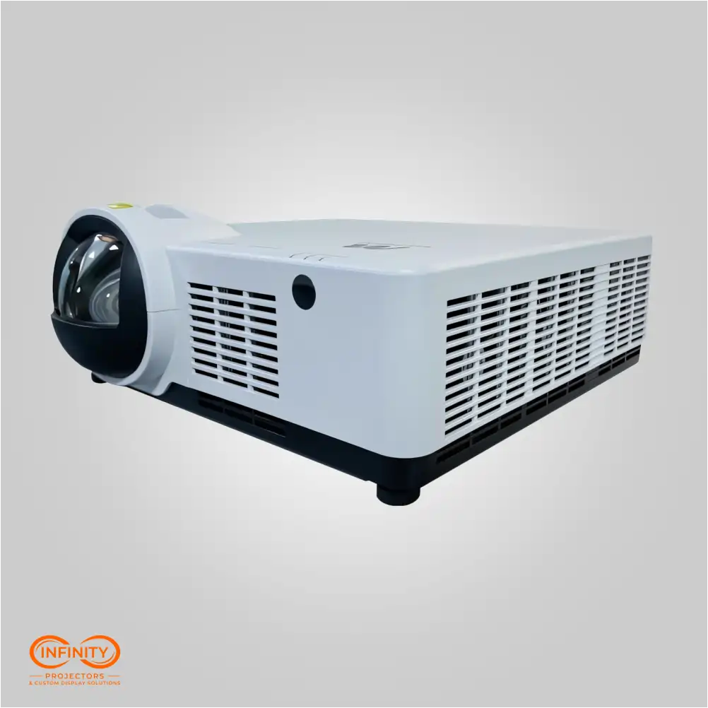 White interactive laser room projector viewed from the lens side, showing dome lens and cooling vents