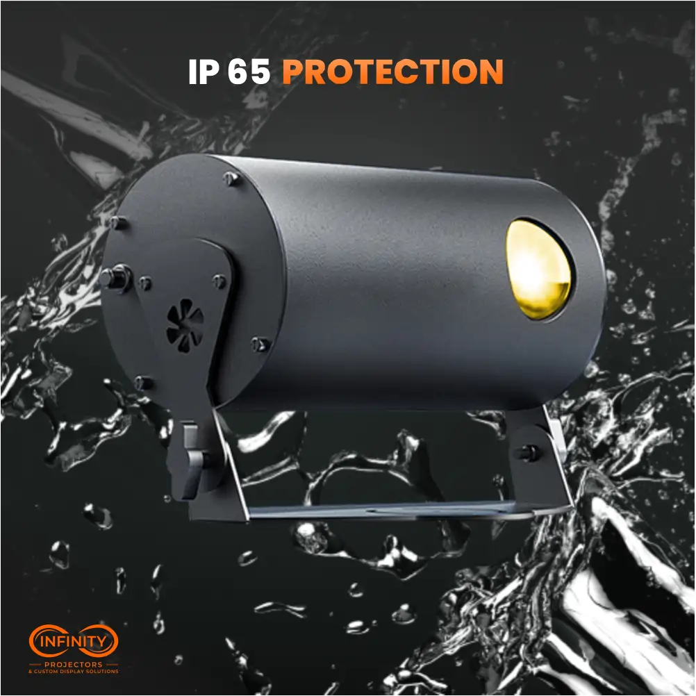 Firefly cylindrical laser projector against splashing water, showing IP65 outdoor protection