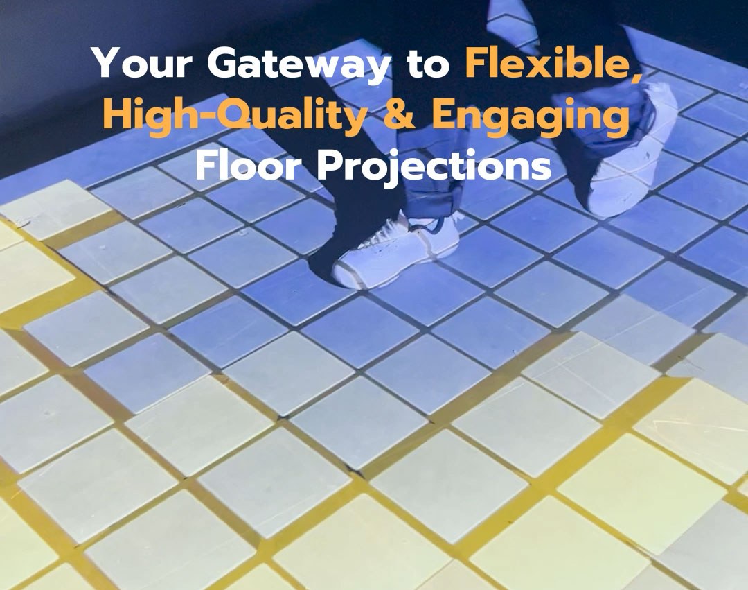 Video: feet step across glowing blue and yellow tiles in an interactive floor game