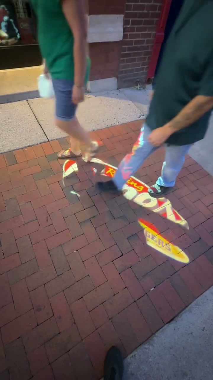 real photo of ground projection near feet