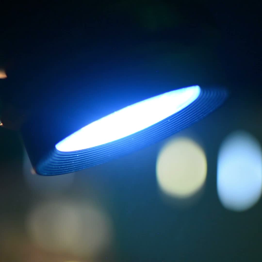 real photo of blue projector beam bokeh