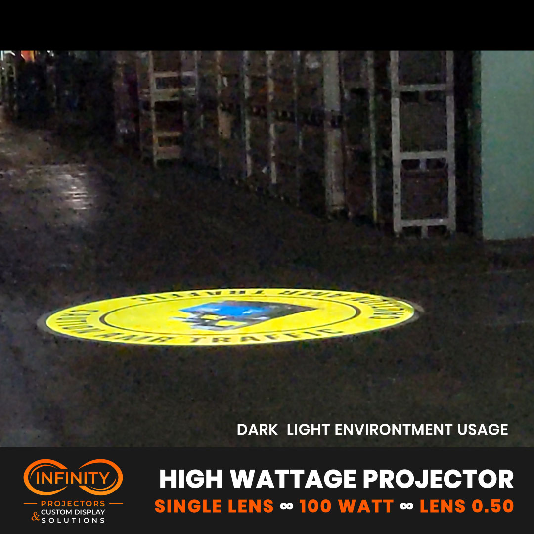 Video: yellow caution safety sign projected on a dark warehouse floor between racks — Infinity Projectors