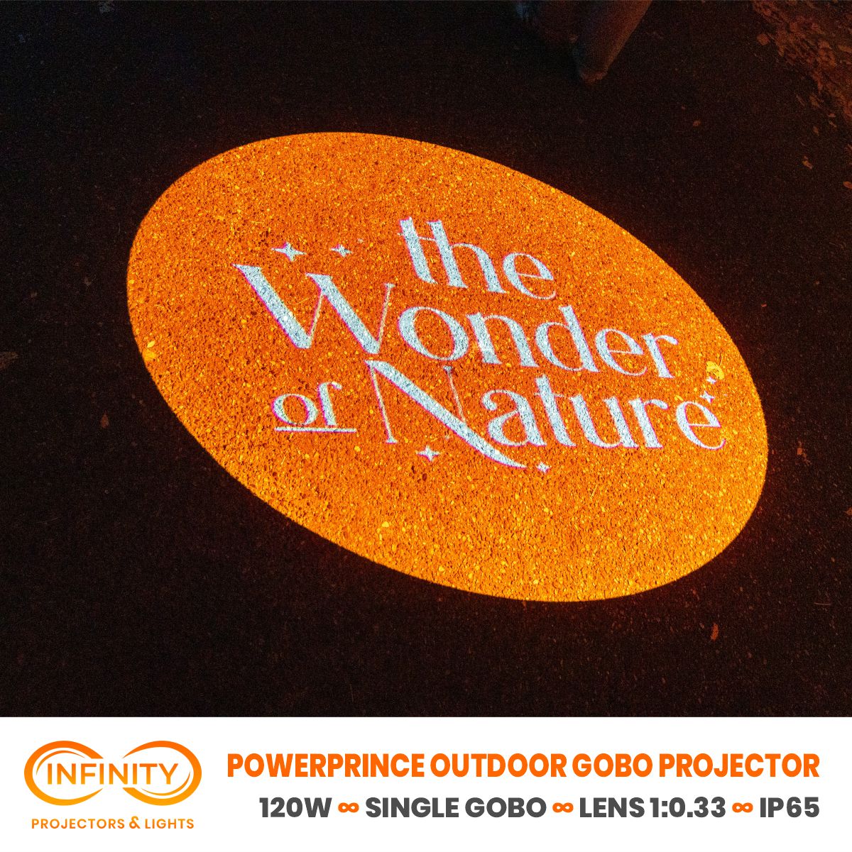 Product image: orange circle projection with white script on asphalt, framed by an Infinity gobo projector banner