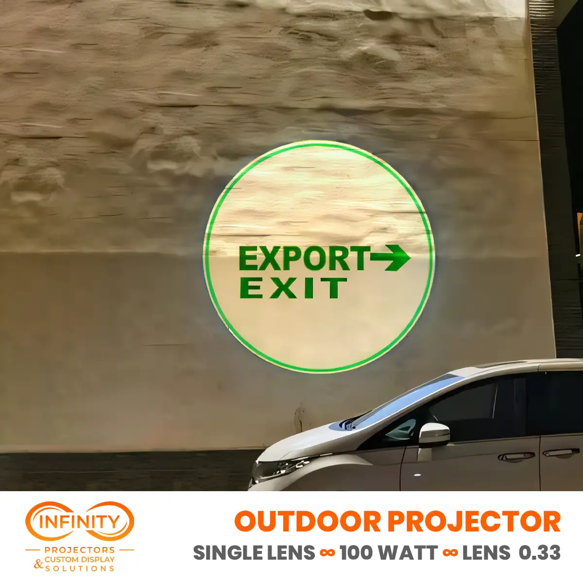 Green Export Exit wayfinding sign with arrow projected in a bright circle on a parking-area wall above a car — Infinity Projectors