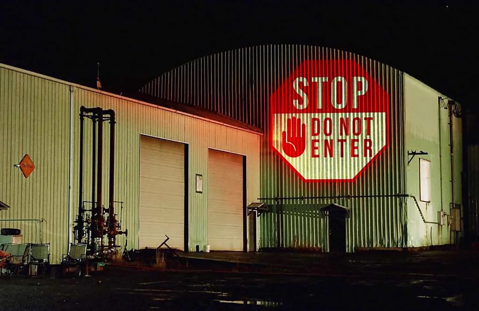 Real Stop Do Not Enter Industrial Wall Projection logo gobo projection — real Business & Branding install | Infinity Projecto — Infinity Projectors