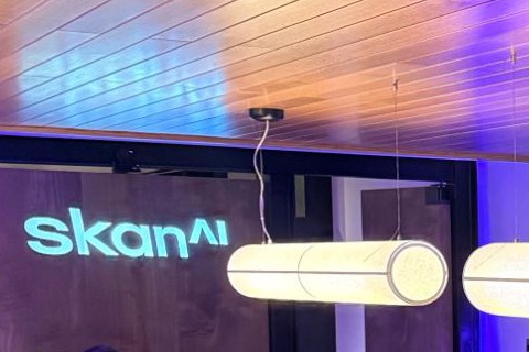PowerPrince gobo projector casting a company logo on a restaurant wall at a corporate dinner — Infinity Projectors
