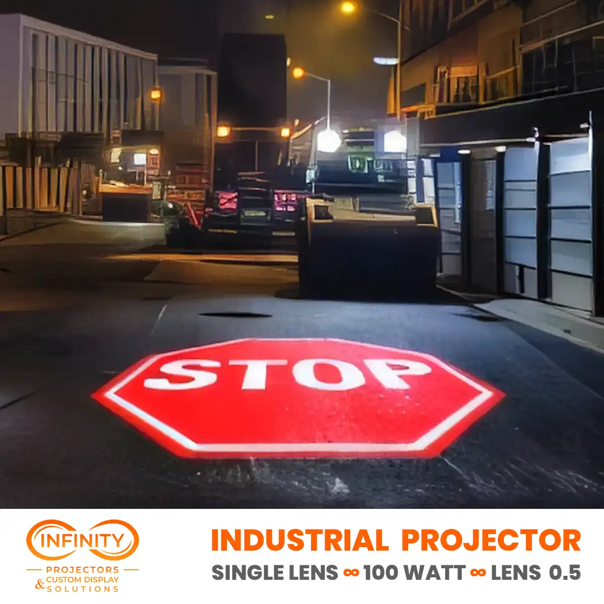 Red stop octagon beamed onto dark asphalt at an industrial yard gate at night by a safety gobo projector — Infinity Projectors