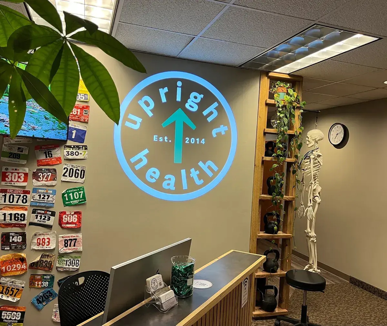 Real Office Reception Desk Logo Projection logo gobo projection — real Business & Branding install | Infinity Projectors — Infinity Projectors
