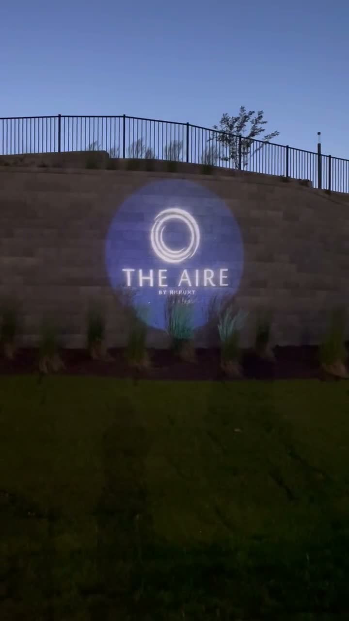 Hhhunt Aire Real Estate Wall Projection Install logo gobo projection — real Business & Branding install | Infinity Projectors — Infinity Projectors