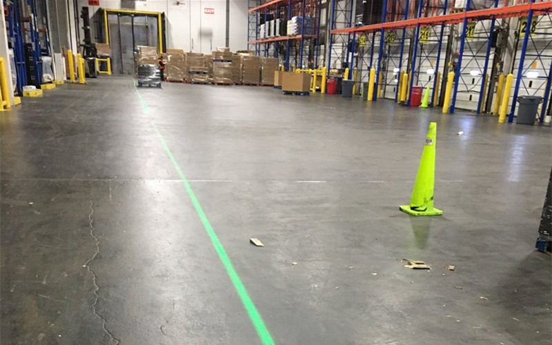real warehouse interior photo with floor dot — Infinity Projectors