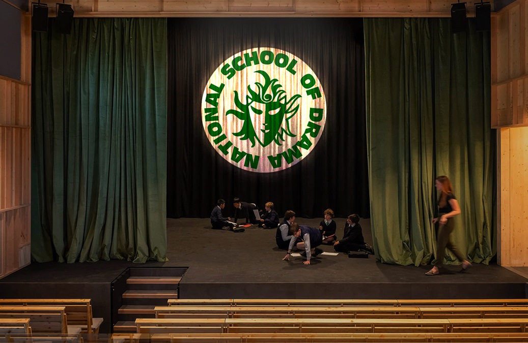 real theater stage photo with logo projected — Infinity Projectors