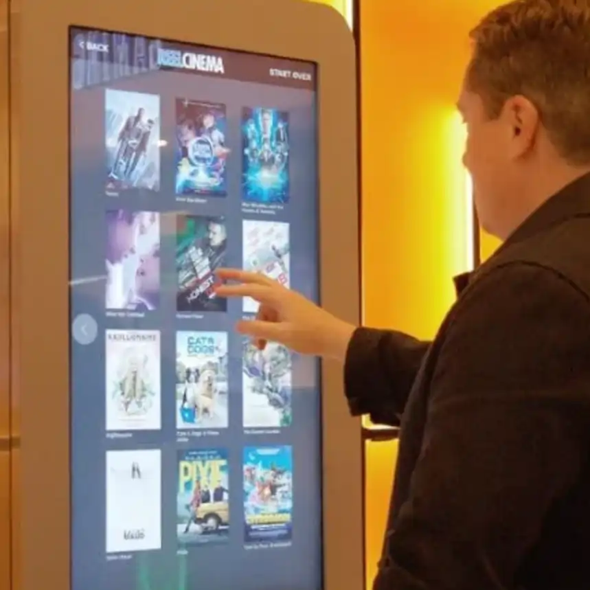 Interactive Floorstanding Touchscreen Kiosks — Real estate logo gobo projection for property branding — projected with a gobo logo projector — Infinity Projectors