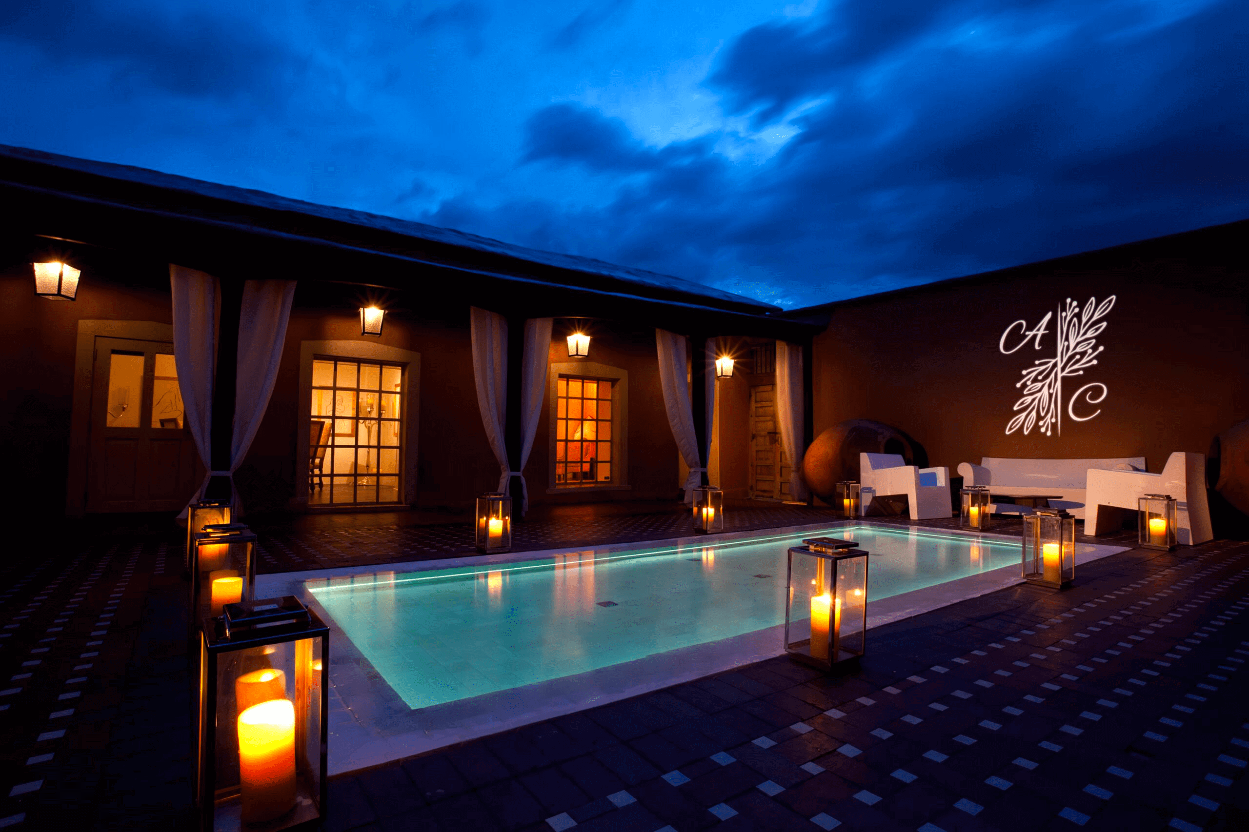 real photo of indoor pool at dusk — Infinity Projectors