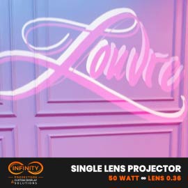 Video: elegant white script name flows across a pink paneled wall in projected light