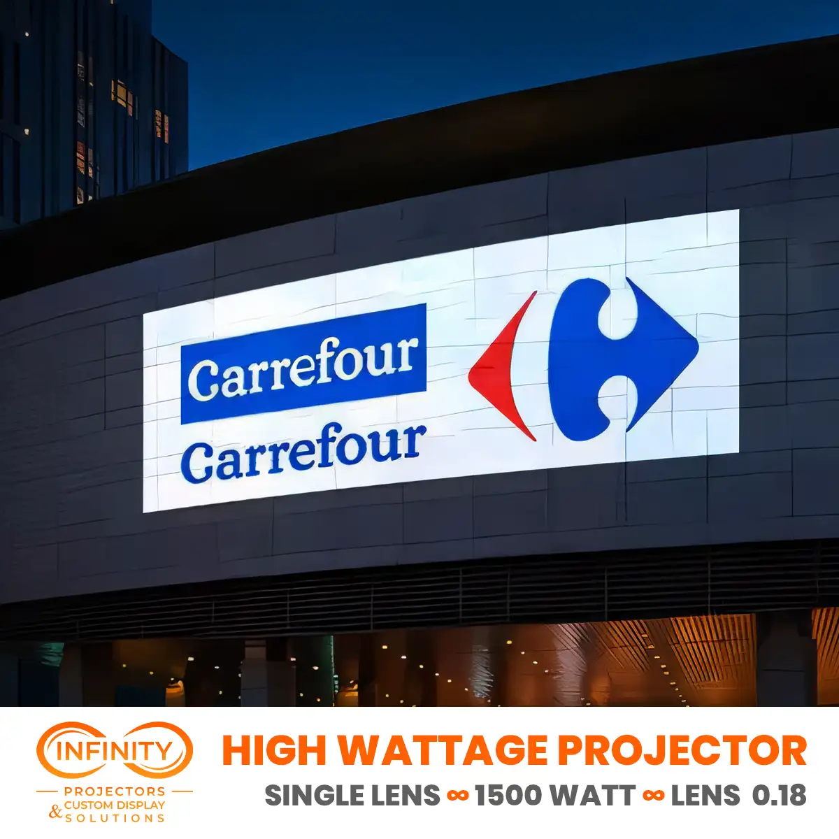 A supermarket chain's logo and name projected huge across a shopping mall facade at dusk — Infinity Projectors