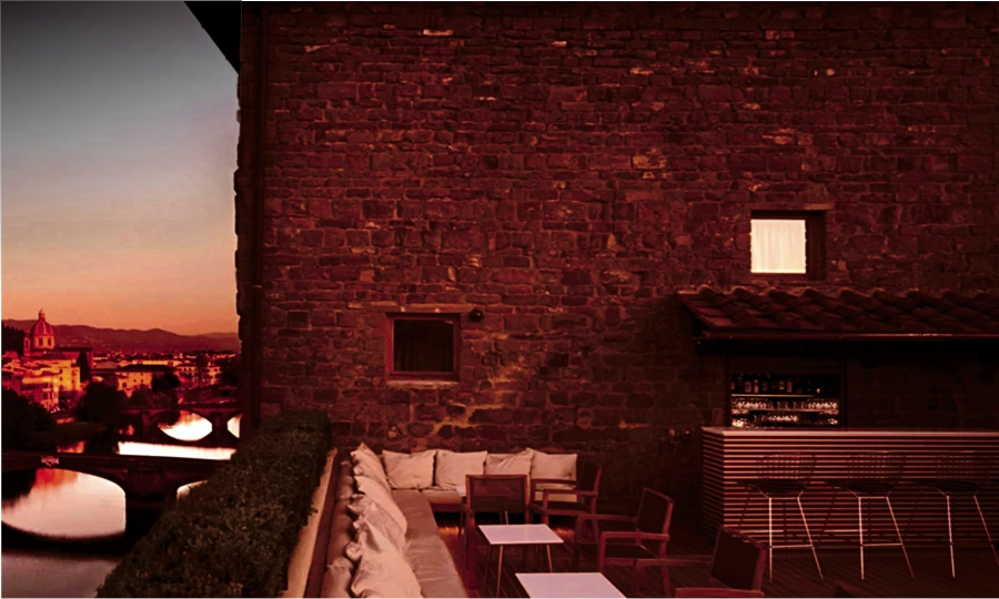 real photo of dark lounge patio with red lighting — real install