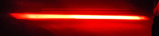 Straight red LED zone line projected on the floor — Infinity Projectors
