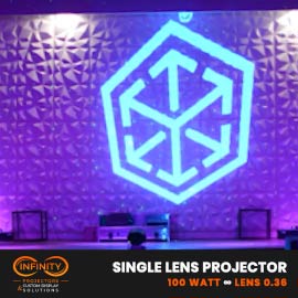 Video: blue geometric cube-and-arrows emblem projected large on a textured ballroom wall