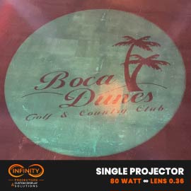 Video: green country club palm-tree logo gobo fills a glowing circle on an event floor