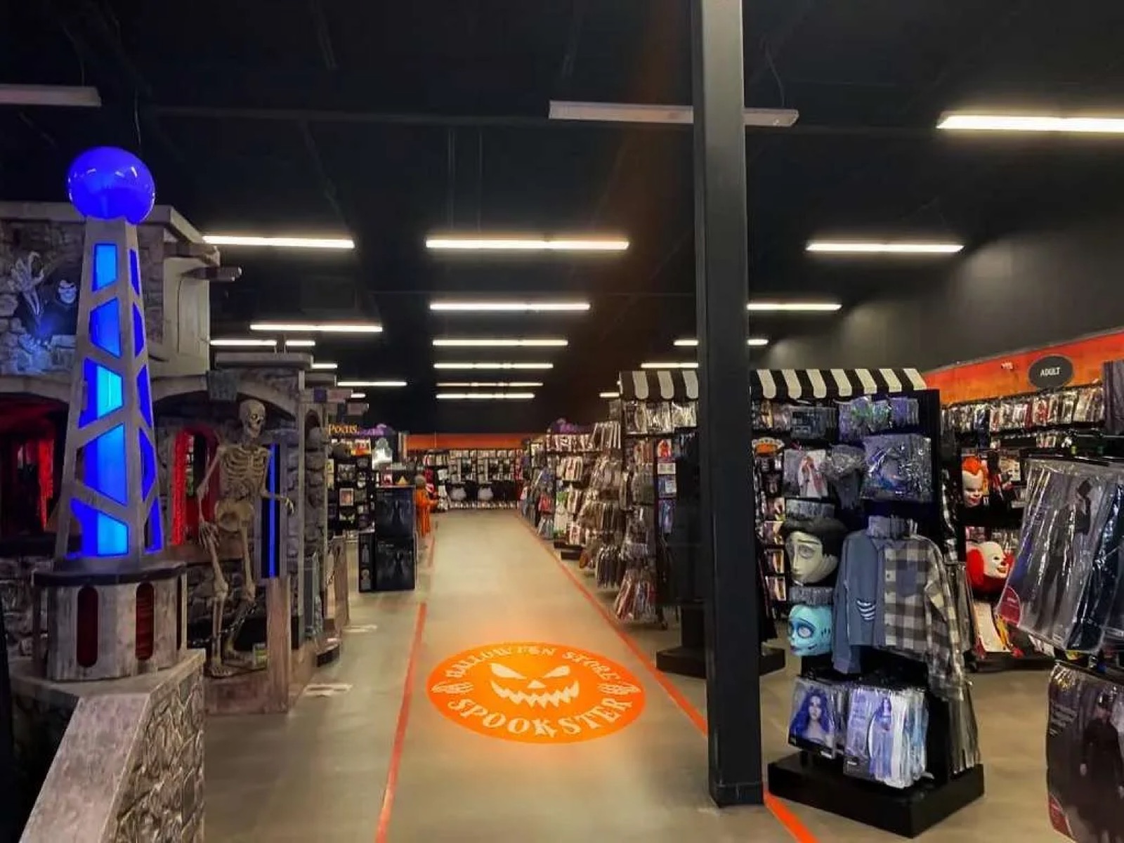 Real Halloween Store Projection logo gobo projection — real Retail & Storefronts install | Infinity Projectors