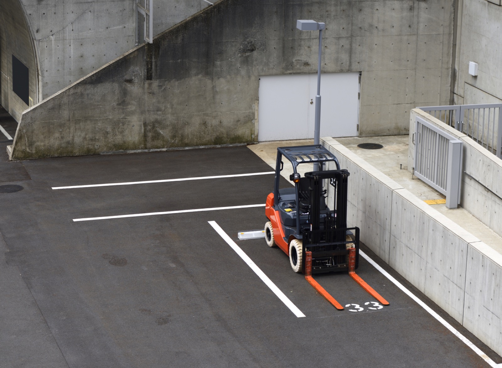 Forklift loading bay — an example venue for custom gobo logo projection | Infinity Projectors
