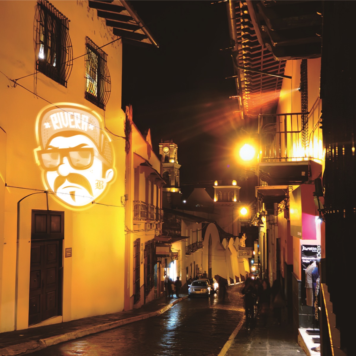 real photo of face icon projected on alley wall — Infinity Projectors