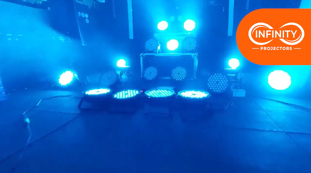 Real photo of blue stage lighting — Infinity Projectors