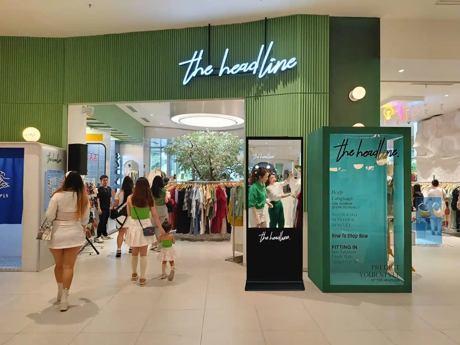 Interactive Floorstanding Touchscreen Kiosks — Real estate logo gobo projection for property branding — projected on-site with an Infinity gobo projector — Infinity Projectors