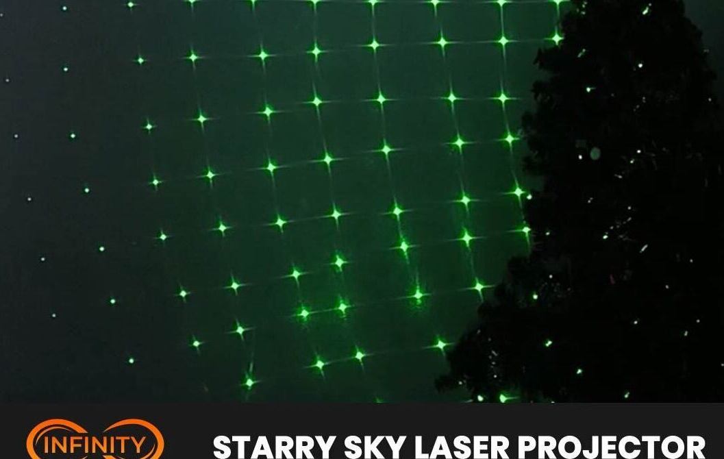 Video: green laser starpoints form a twinkling net on a wall beside a dark holiday tree
